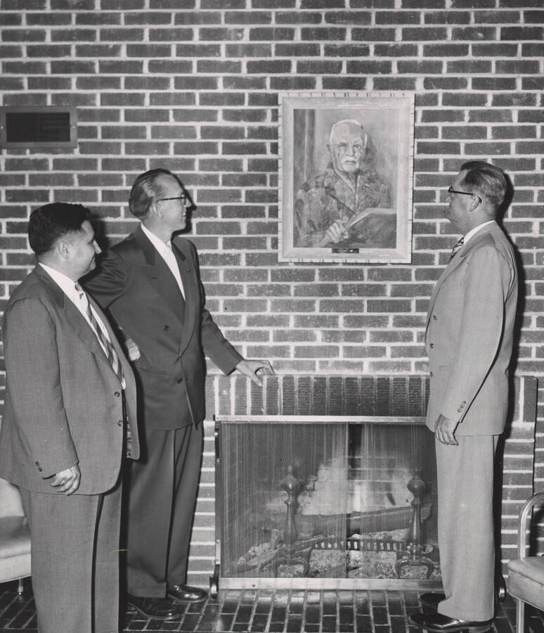 October 3, 1952 photograph of the James Memorial Clubhouse dedication ceremony. Left to right: Gale Mix, J. Ray Cox, Jess E. Buchanan. [PG1_163-03]