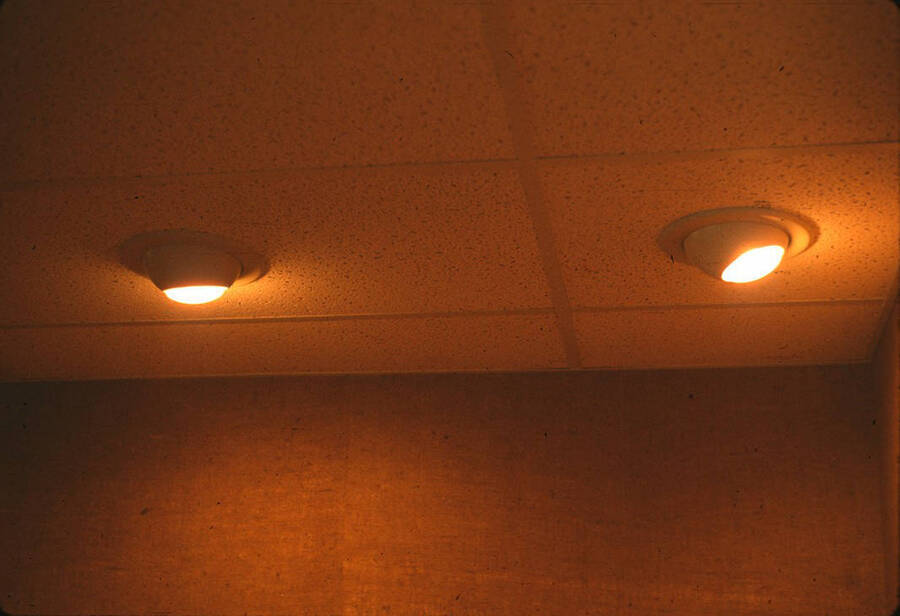 1975 photograph of Art and Architecture South during renovation. Detail of ceiling light fixtures. Donor: Karl Roenke and Robert Weaver, 1976. [PG1_167-096]