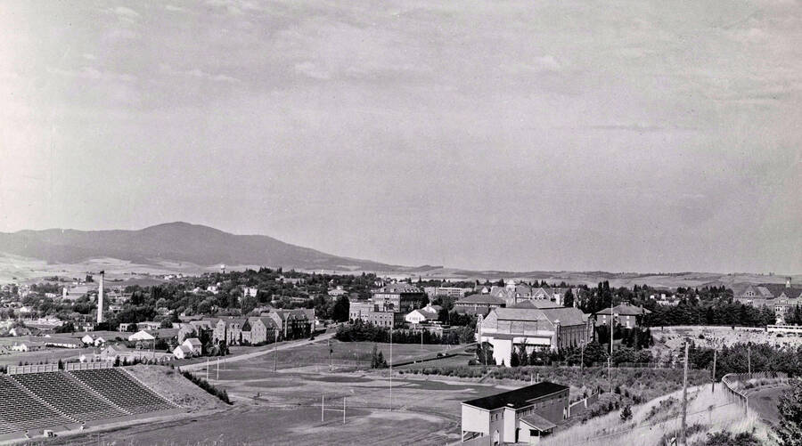 1950 panoramic photograph of University of Idaho campus. Northeast view of Neale stadium and grandstand. [PG1_002-14]