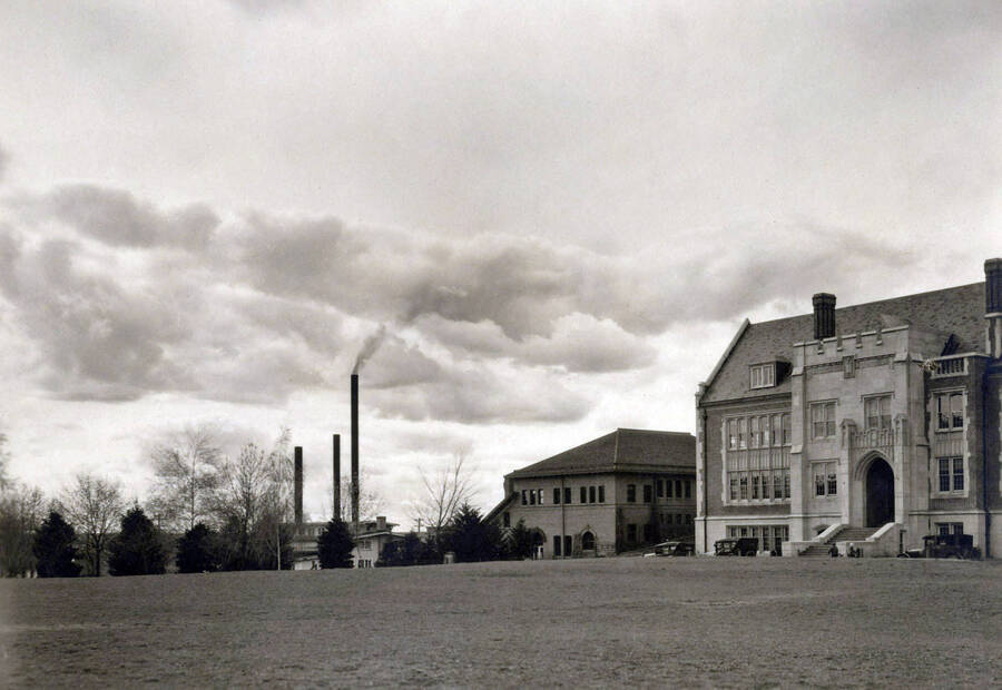 1926 panoramic photograph of University of Idaho campus. Main entrance into the Science Hall with the steam power plant stacks in the background. Donor: Biological Sciences Dept. [PG1_002-39]