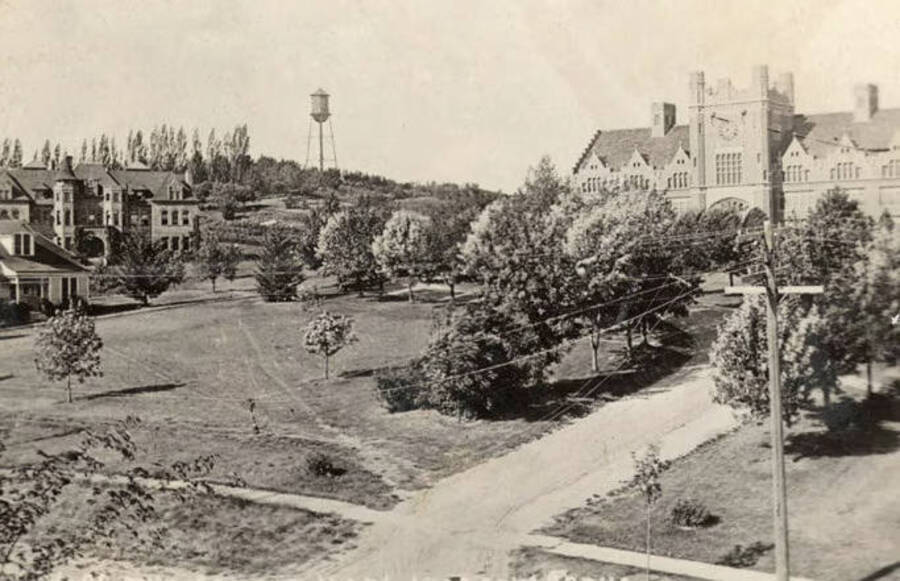 1916 panoramic photograph of University of Idaho campus. View of administration Building on the right and the water tower to the left. From Caroline Munson Ott scrapbook. Donor: Jeanette Talbott. [PG1_002-64]