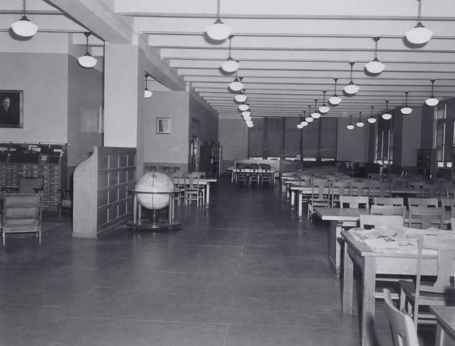 1957 photograph of the Library. View of the second floor periodical reading room. Also print. [PG1_201-18]