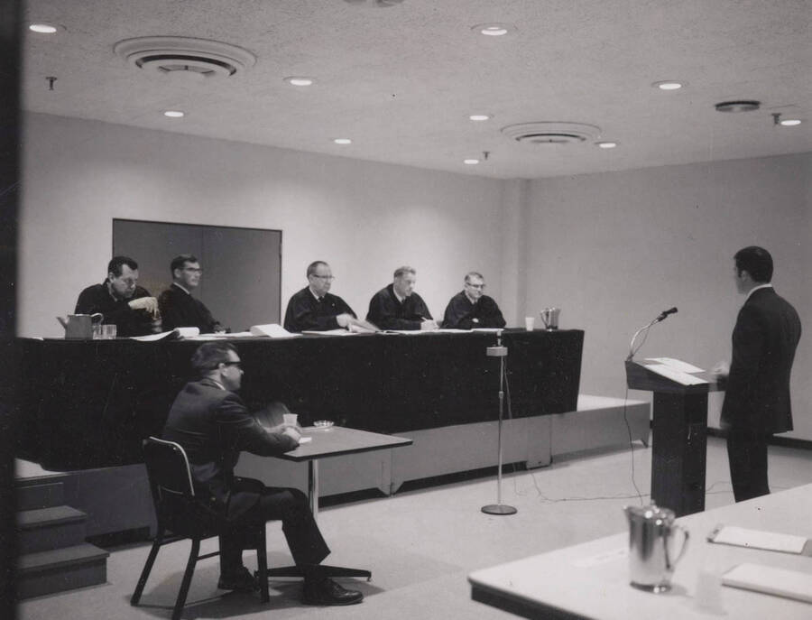 1969 photograph of the College of Law. Idaho Supreme Court at Moot Court competition. Donor: Clarice Moody Sampson. [PG1_203-10]