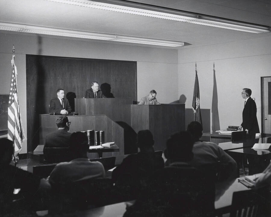 1952 photograph of the College of Law. Students participate in a mock trial. [PG1_203-02]