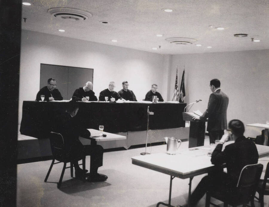1969 photograph of the College of Law. Idaho Supreme Court at Moot Court competition. Donor: Clarice Moody Sampson. [PG1_203-09]