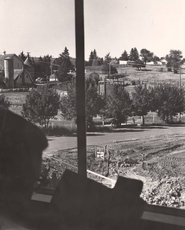 1940 photograph of University Farm. The grounds of the poultry farm as seen from a window. Donor: Jeanette Talbott, 3/2000. [PG1_206-12]