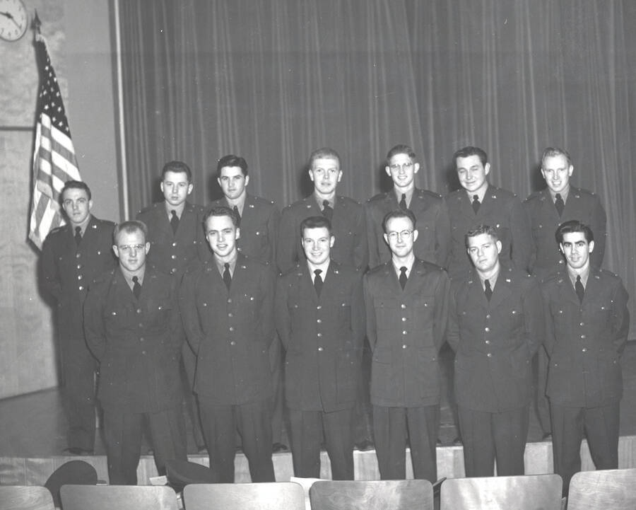 1953 photograph of Air Force Officer Education Program l-r: (front) L. D. Ringe, R.J. Nixon, B.H. Erstad, J.S. Wegher, R.W. Eimers, J.W. Jewell; (back) J.L. Whybark, C.A. Schmid, N.A. O'Donnell, B.P. Budge, R.M. Reeves, D.L. Welch. [PG1_207-02]