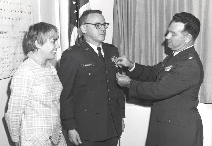 1960 photograph of Air Force Officer Education Program. A medal pinning ceremony. [PG1_207-06]