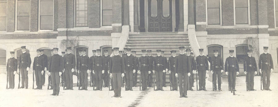 1905 photograph of Military Science Cadets. Cadet company 'A' in formation in front of old Administration building steps. [PG1_208-011]