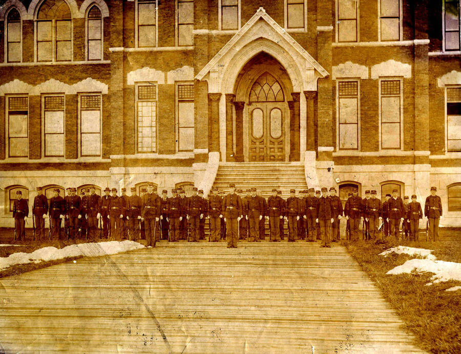 1905 photograph of Military Science Cadets. Cadets on parade in front of the old Administration building. Donor: W.C. Edmundson. [PG1_208-113]