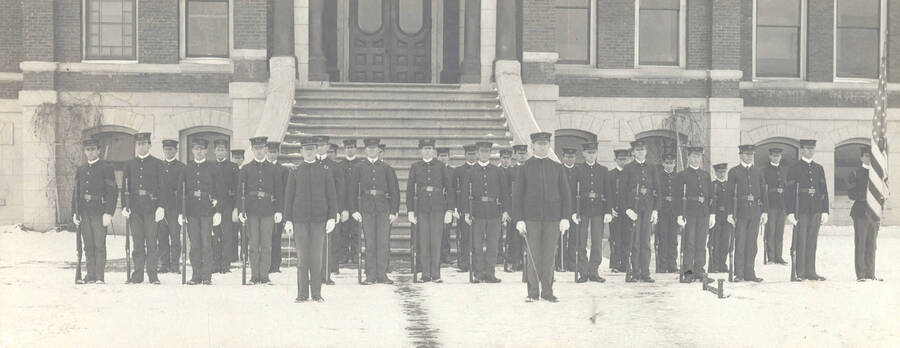 1905 photograph of Military Science Cadets. Cadet company 'B' in formation in front of old Administration building steps. [PG1_208-012]