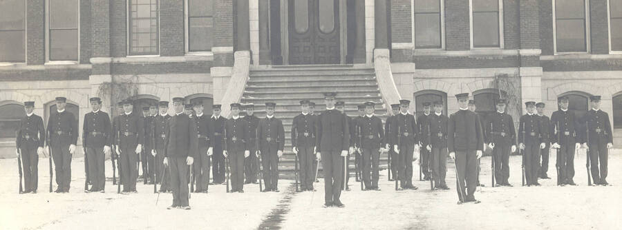 1905 photograph of Military Science Cadets. Cadet company 'B' in formation in front of old Administration building steps. [PG1_208-013]