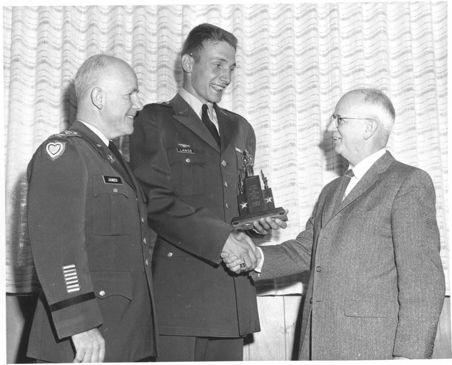 1961 photograph of Military Science Cadets. l-r: Col. George James, Cadet Charles W. Lange Jr., H.Walter Steffans. Donor: Publications Dept. [PG1_208-131]