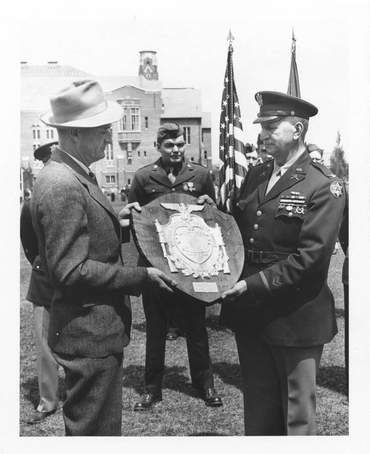1947 photograph of Military Science Cadets. l-r: President J.E. buchanan, Col. B. H. Hensley. [PG1_208-148]