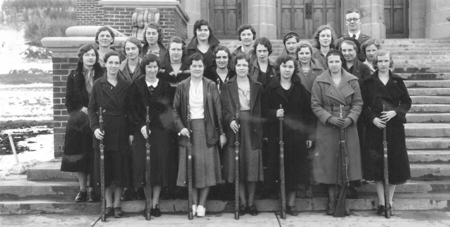 1932 photograph of Military Science Cadets. Women's Rifle Team standing on steps. Donor: Gerald Hodgins. [PG1_208-149]