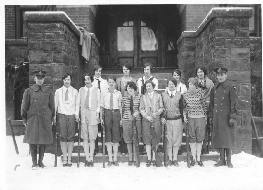 1927 photograph of Military Science Cadets. Women's Rifle Team standing in front of building's steps. Donate 7/11/97. Donor: Gift from Gould Estate. [PG1_208-151]