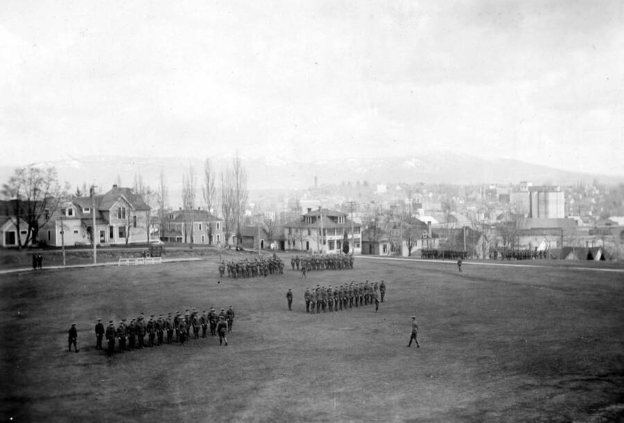 1922 photograph of Military Science Cadets. ROTC cadets on parade in field. [PG1_208-152]