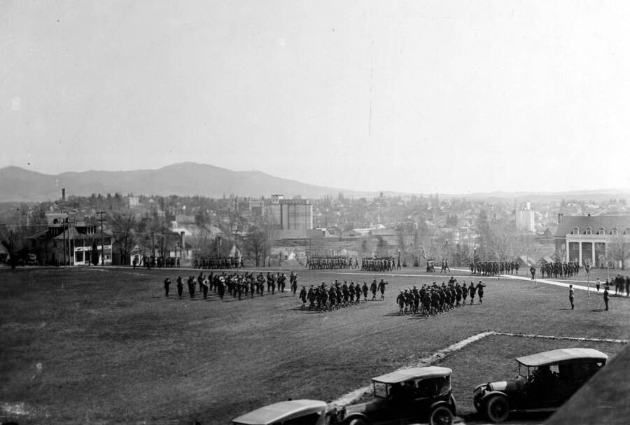 1922 photograph of Military Science Cadets. ROTC cadets on parade in field. [PG1_208-153]