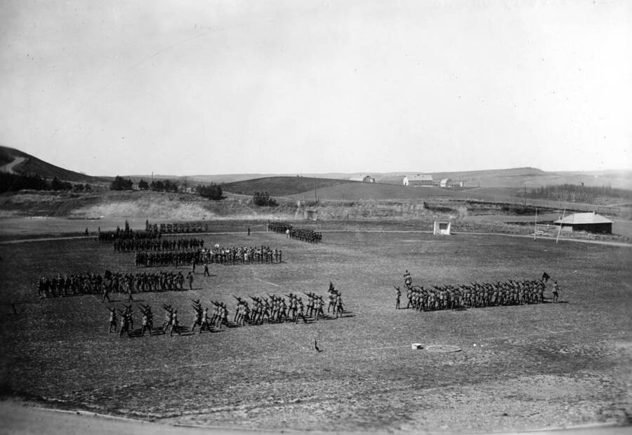 1926-04-24 photograph of Military Science Cadets. Military cadets in parade formation on MacLean field. [PG1_208-163]