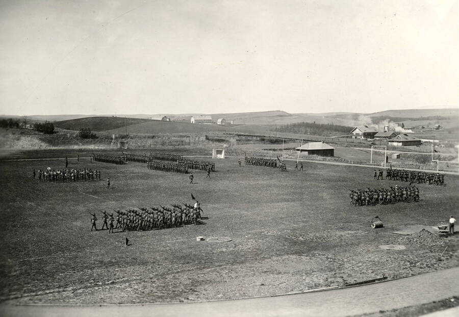 1926-04-24 photograph of Military Science Cadets. Military cadets in parade formation on MacLean field. [PG1_208-164]