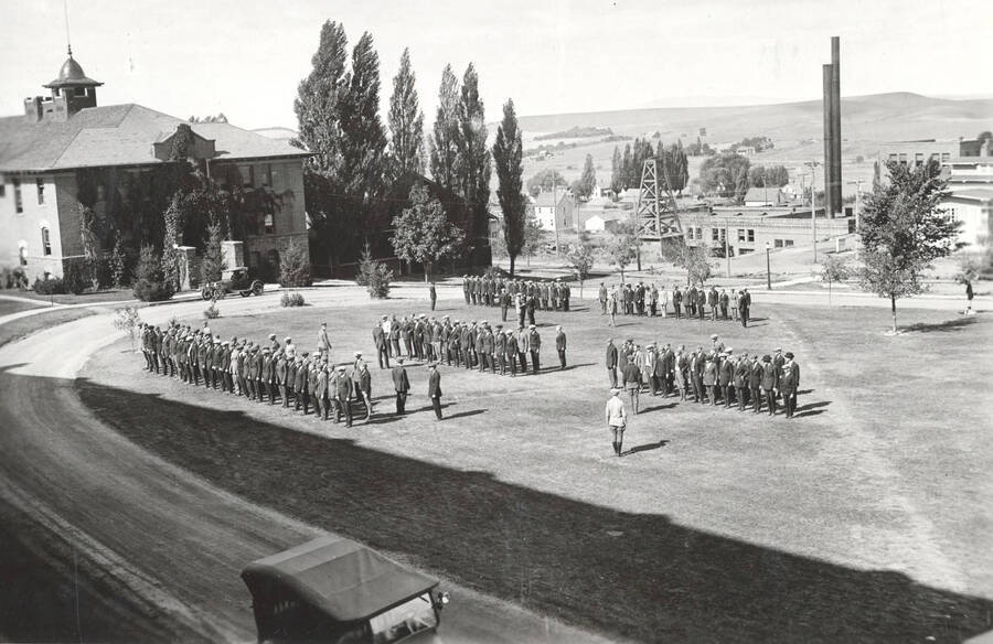 New recruits at inspection before gymnasium. Military Science. University of Idaho. [208-32]
