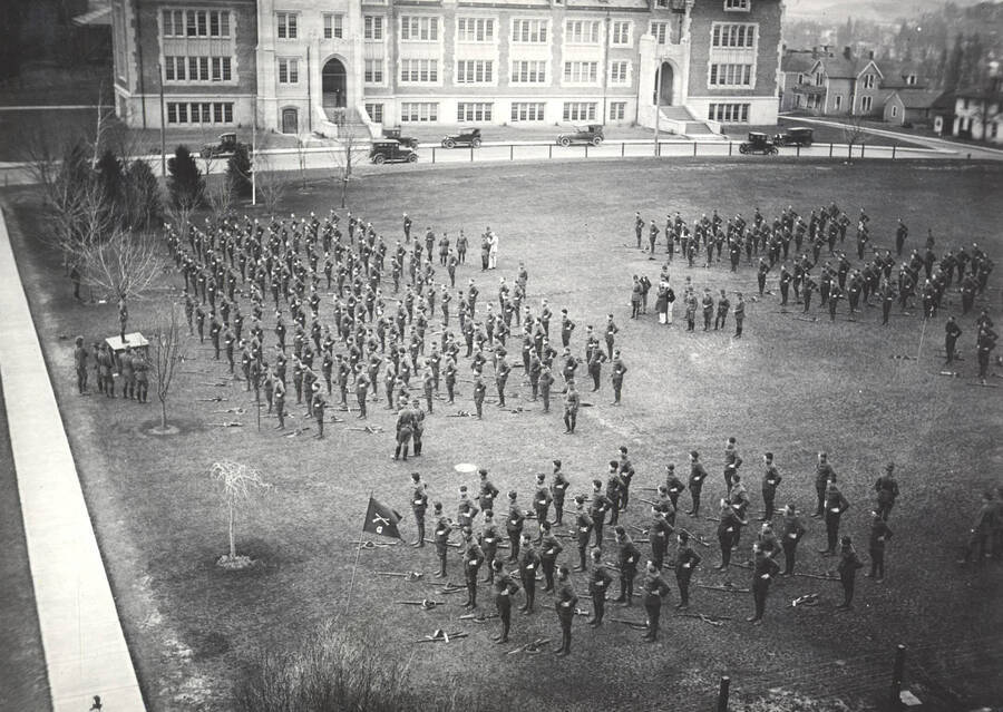 1926 photograph of Military Science Cadets. Military cadets on inspection in front of the Science Hall. [PG1_208-039]