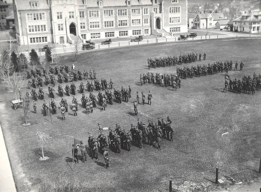 1926 photograph of Military Science Cadets. Military cadets on inspection in front of the Science Hall. [PG1_208-040]