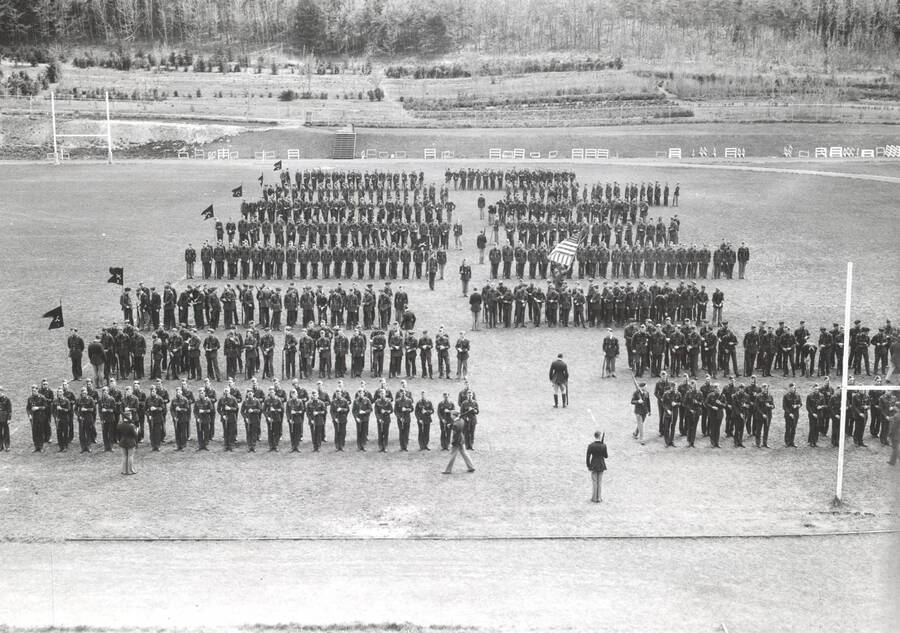 1936 photograph of Military Science Cadets. Military cadets on inspection at MacLean Field. [PG1_208-043]