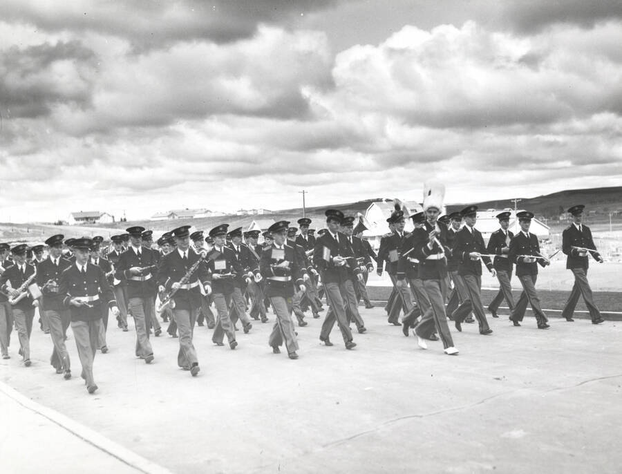 1936 photograph of Military Science Cadets. Military band marching. [PG1_208-045]