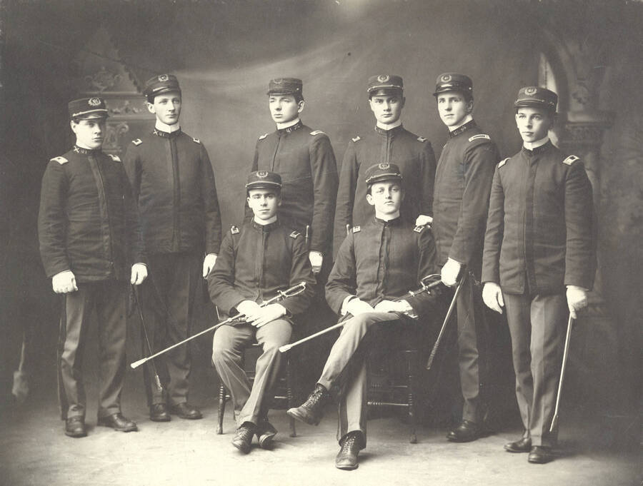 1903 photograph of Military Science Cadets. Portait of cadet officers. l-r: (front) John Auld, Robert Ghormley, (Back) Howard Kirkwood, Earl David, Clarence Edgett, Lloyd Gibson, Earl Barton, Leroy Zeigler. [PG1_208-048]