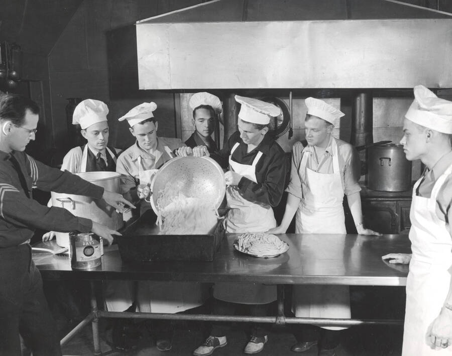 1941 photograph of Military Science Cadets. Military cadets in a cooking class. [PG1_208-050]