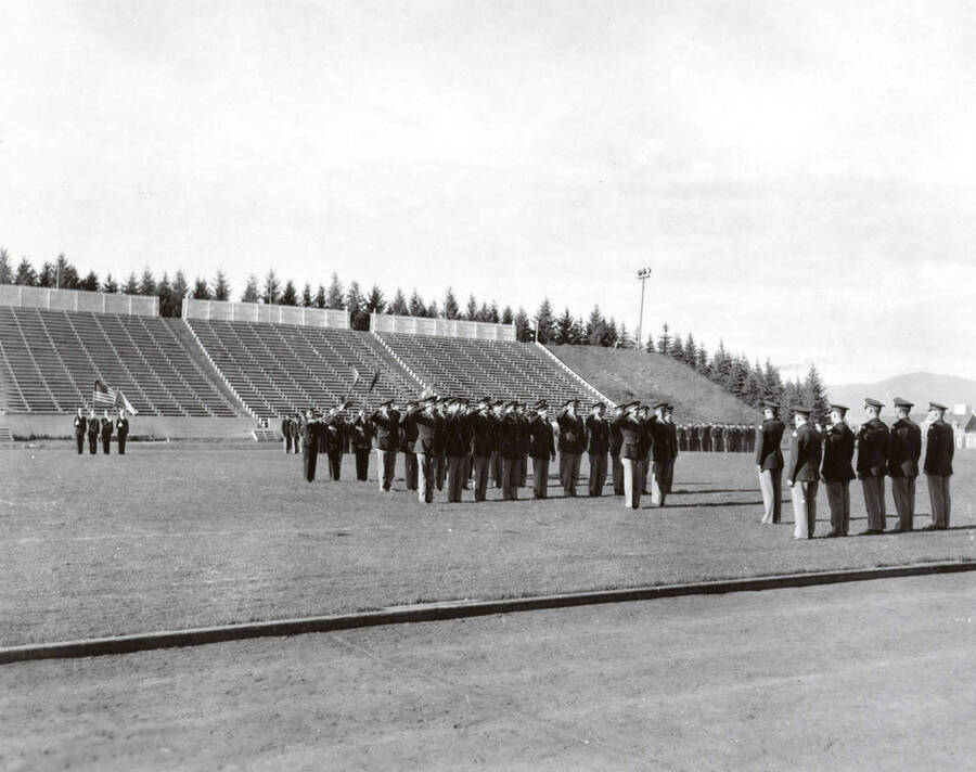 1953 photograph of Military Science Cadets. Military cadets on parade at MacLean field. [PG1_208-065]