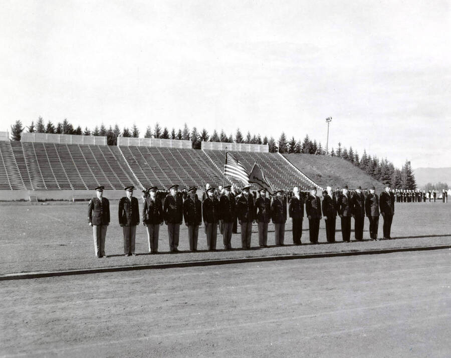 1953 photograph of Military Science Cadets. Military cadets on parade at MacLean field. [PG1_208-066]