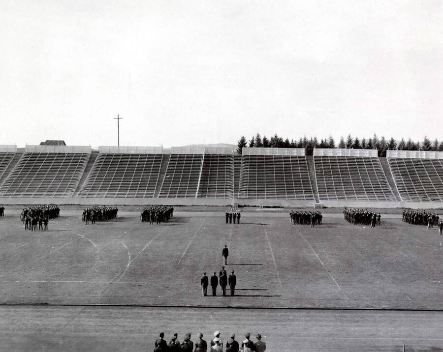 1953 photograph of Military Science Cadets. Military cadets on parade at MacLean field. [PG1_208-067]