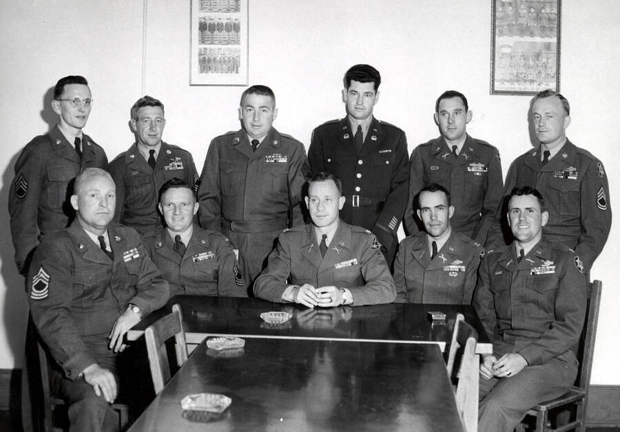 1953 photograph of Military Science Cadets l-r: (front) Shoemaker, Perkins, Blewett, Burnett, Woods; (back) Grandon, Salyer, aird, Williams, Moore, Prescott. [PG1_208-080]