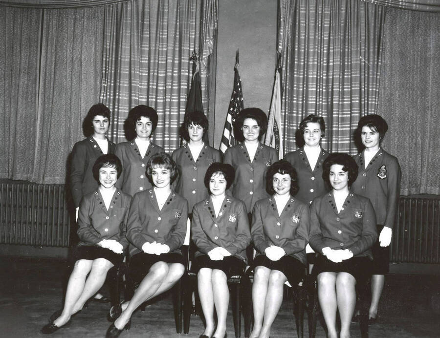 1961 photograph of Military Science Cadets. l-r: (front) Bishop, Naslund, Llewellyn, McCullough, Cook; (back) Weber, Thompson, Sharp, West, Wilson, Smith. Donor: Army ROTC. [PG1_208-099]