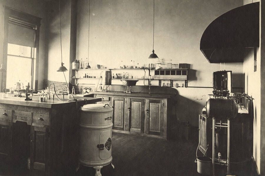 1910 photograph of Bacteriology building. View of the workstations in the lab. [PG1_212_09]