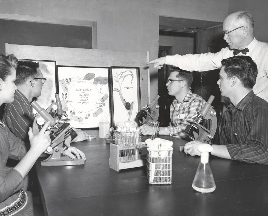 1950 photograph of Agronomy laboratory. Dr. Klages instructing students in the Agronomy Laboratory. [PG1_220-02]