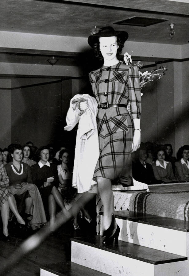 1942-05-02 photograph of Home Economics. A student modeling a dress during a fashion show. [PG1_221-027]