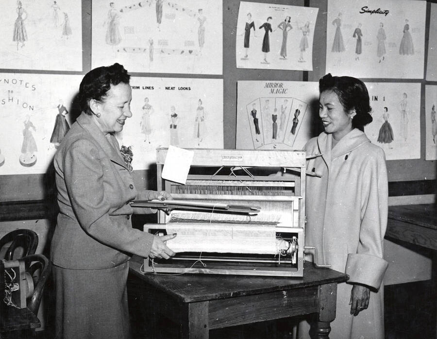 1952 photograph of Home Economics. Weaving demonstration, Margaret Ritchie and Gertrudis Yabes Vallejos Donor: Publications Dept. [PG1_221-049]