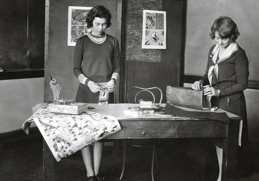 Home Economics. University of Idaho. Students wrapping gifts. [221-9]