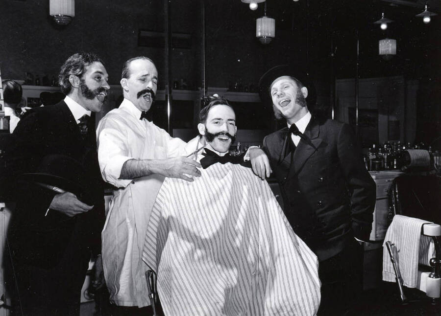 Old Barbershop Quartet rehearsing for Red Cross Benefit Concert. Music, University of Idaho. [222-106a]