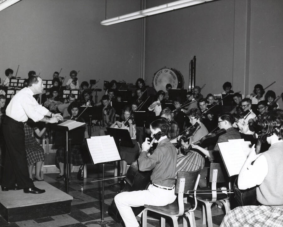 1960 photograph of Music Department. Summer school orchestra during rehersal. [PG1_222-019]