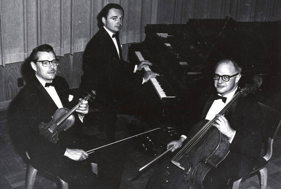 1961 photograph of Music Department. Music Faculty Trio LeRoy Bauer, David Tyler, and David Whisner with their instruments. Donor: Publications Dept. [PG1_222-032]