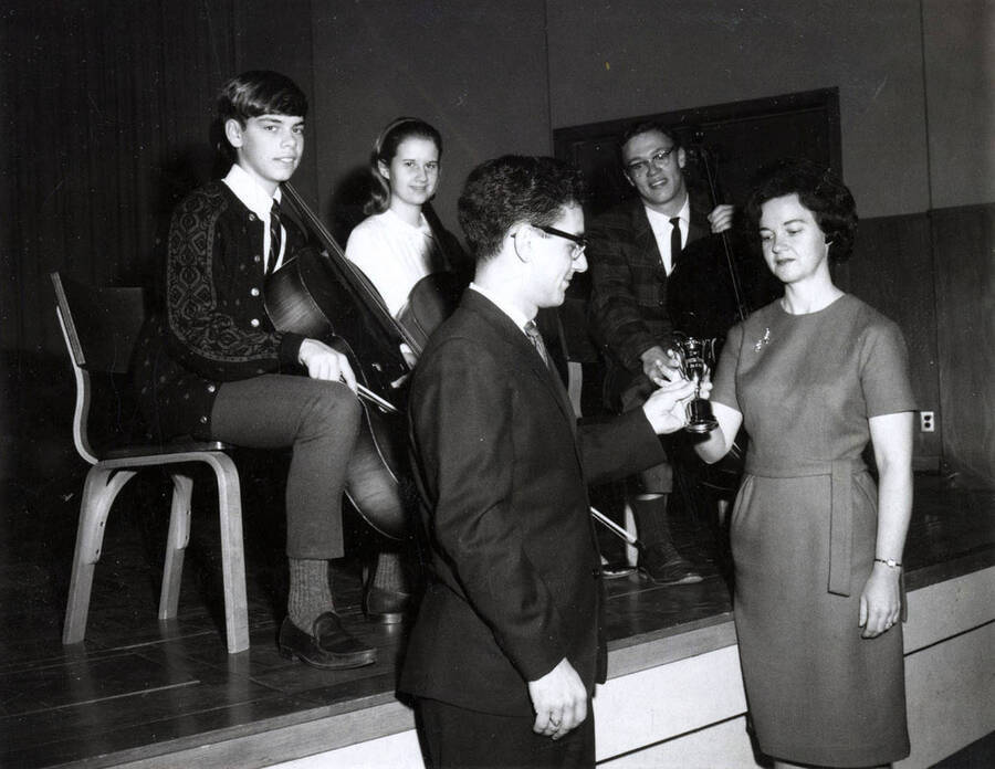 1966 photograph of Music Department. Charles Bauer, Shirley Cowen, Achilles Balabanis, Steven Bray, Lois Lyon. Donor: Publications Dept. [PG1_222-039]