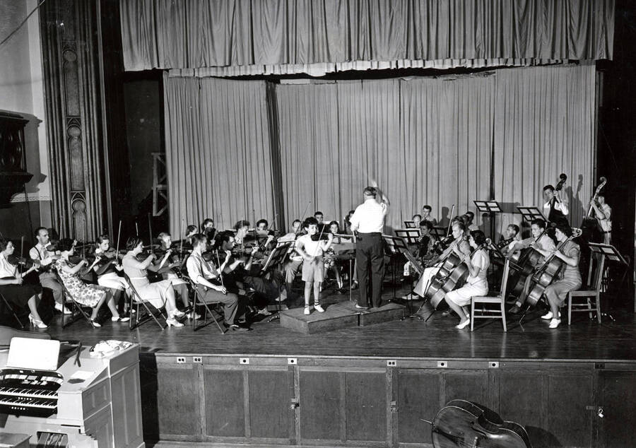 1938 photograph of Music Department. Vladimir Bakaleinikoff directs the summer school orchestra. [PG1_222-004]