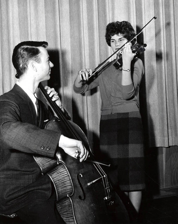 1953 photograph of Music Department. String duo performing. Donor: Publications Dept. [PG1_222-044]