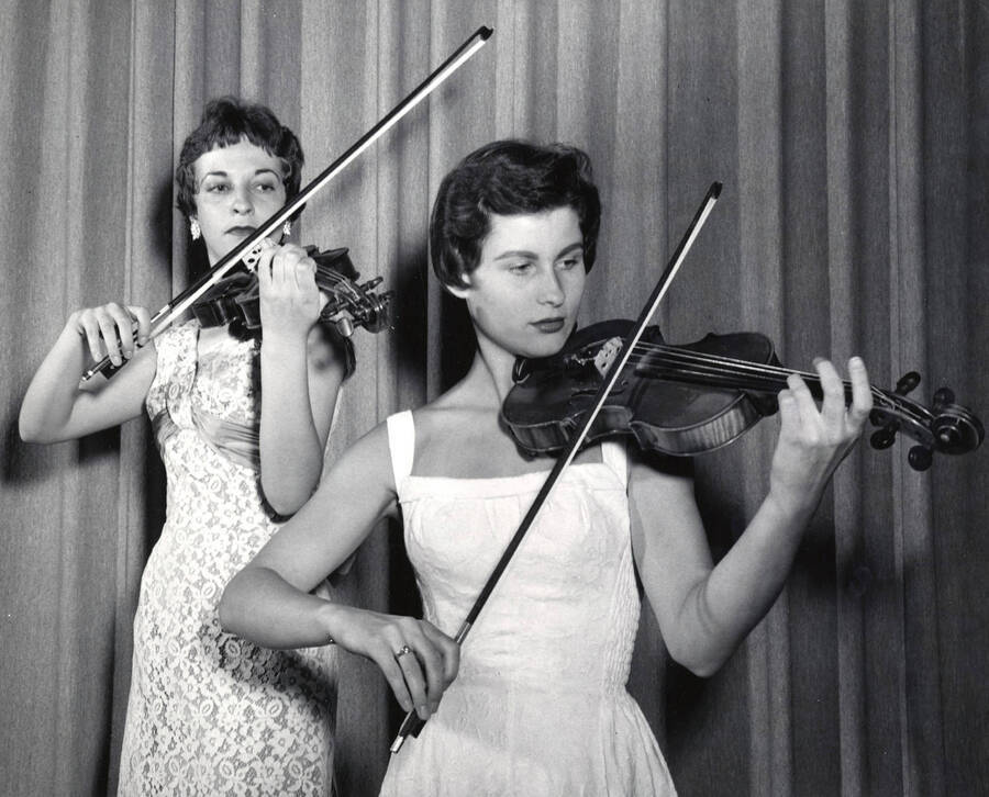 1952 photograph of Music Department. Violin Duo performing. Donor: Publications Dept. [PG1_222-047]