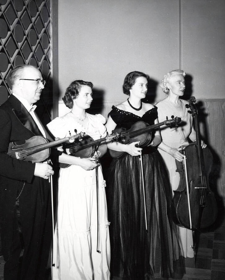 1954 photograph of Music Department. String quartet Carl Claus, Leora Patterson, Joyce Hooker, and Miriam Little. Donor: Publications Dept. [PG1_222-057]