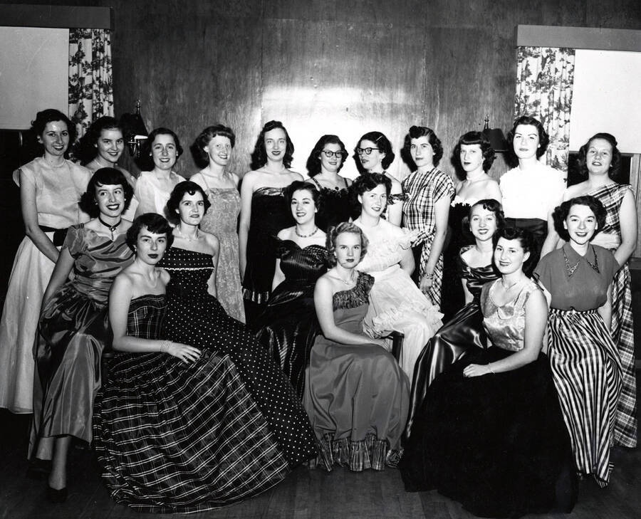 1952 photograph of Music Department. Sigma Alpha Iota, Women's Music Honorary (seated) N. Nokes, J. Raber, J. Peters, P. Rambo, E. Simons, J. Jacobs, J. Coble, J. Walser, B. Baer; (standing) R. Reynolds, N. Shelton, E. Wilcox, J. parks, M. Moline, D. Knight, A. Pickett, B. Clauser, R. Beiber, B. Schupfer, and M. Mehl. Donor: Publications Dept. [PG1_222-060]